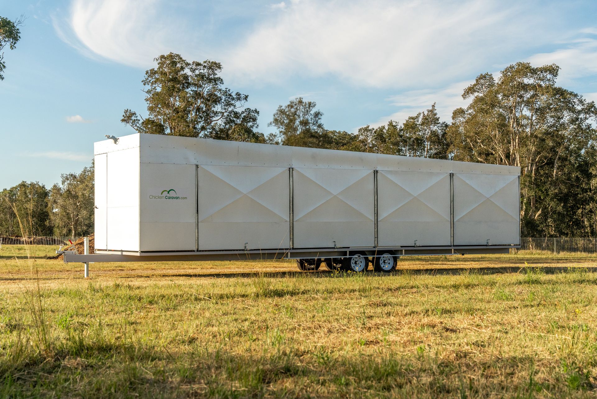 Our biggest caravan yet - The Chicken Caravan 600 Chicken Caravan 600 in paddock, doors down