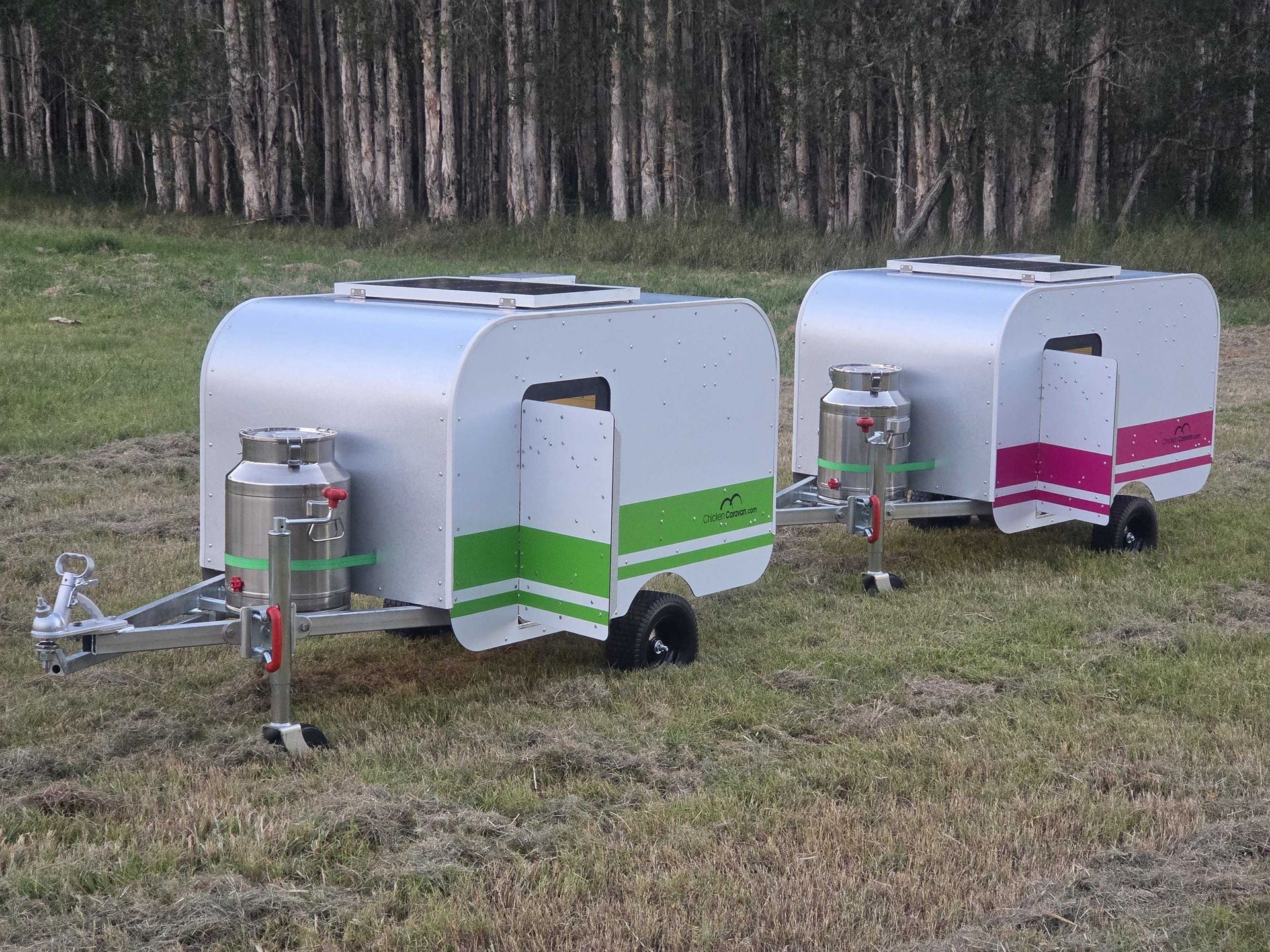 The newest update to the Chicken Caravan 10 - metal drinkers Chicken Caravan 10s nest to each other in pink and green